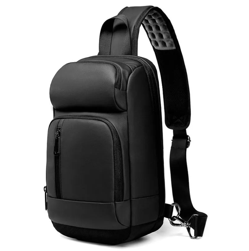 Black medium-sized PVC outdoor shoulder bag with a single strap and internal organiser pockets.