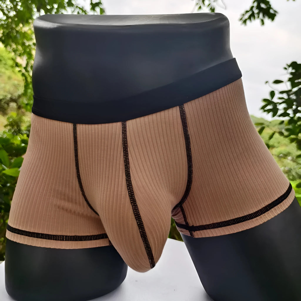 Men's solid colour breathable fibre boxer shorts shown in army green, demonstrating thin fabric and fit.