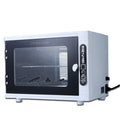 Small silver UV steriliser cabinet for nail salon and barber shop tools.