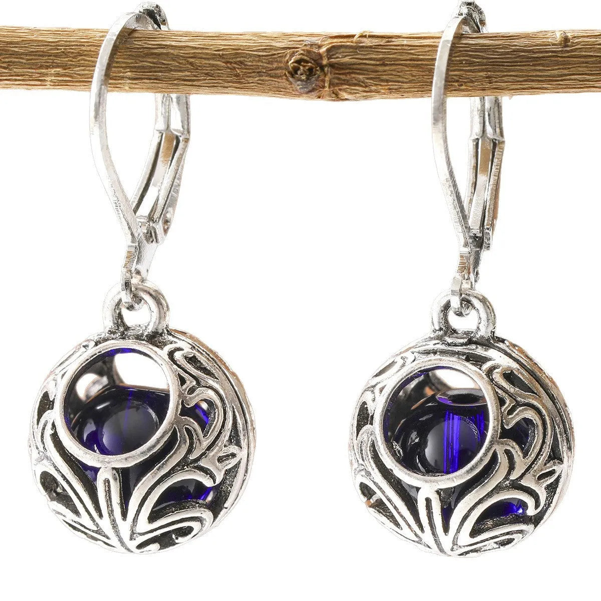 Silver geometric vintage engraving hollow drop earrings with blue gemstone centre