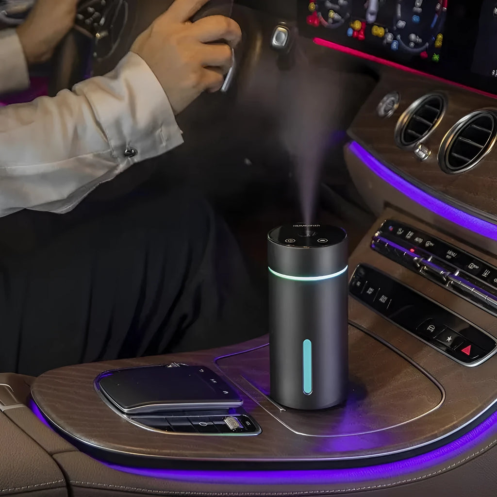 Aluminium car and desktop humidifier diffuser with 260ml tank and colourful LED light on black background.