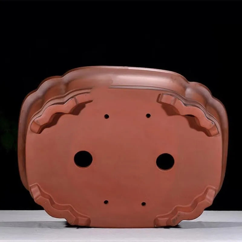Large antique-style purple clay flowerpot with Chinese design for garden planting