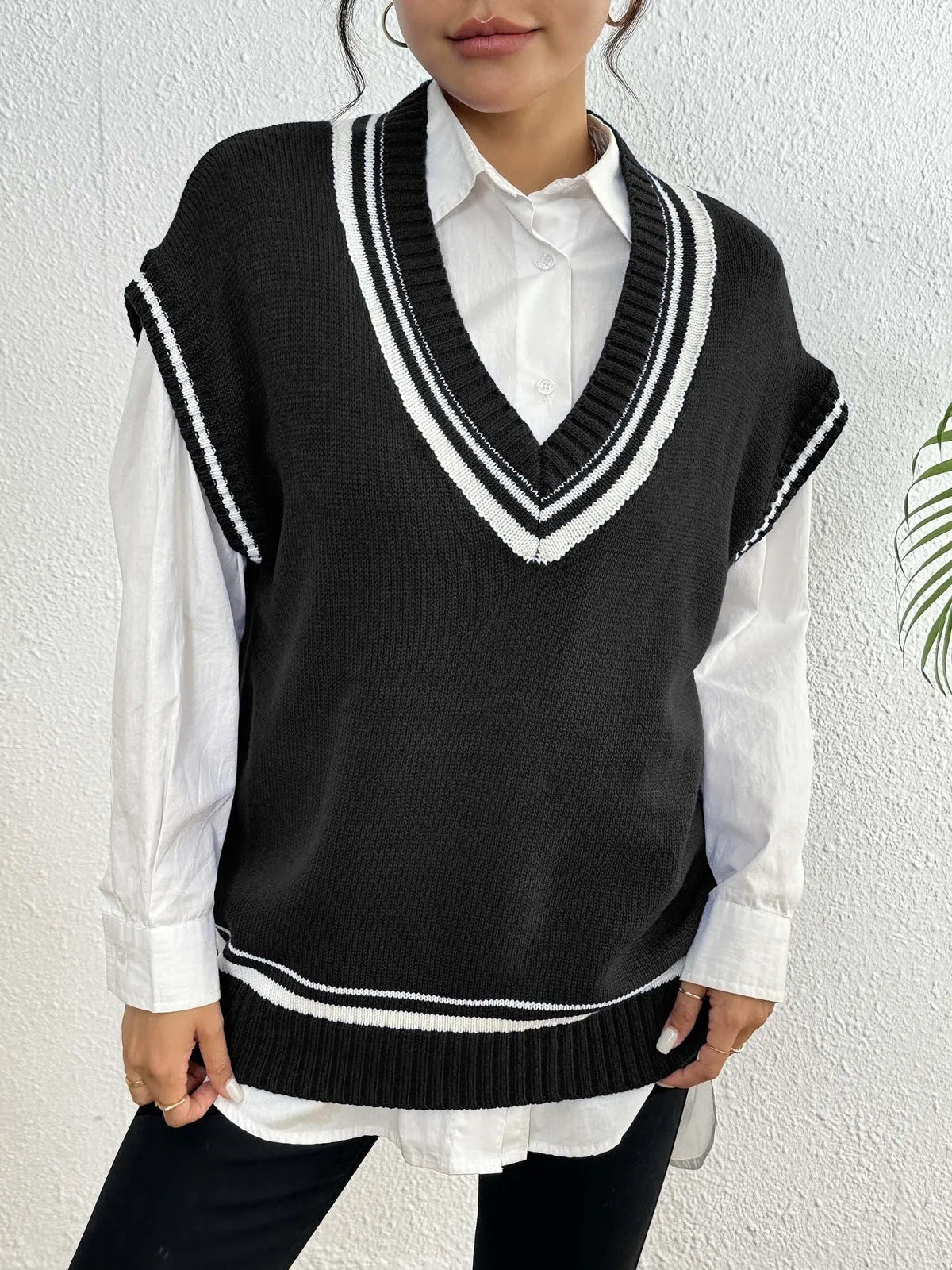 Women's loose-fit college-style pullover vest jumper in black, blue, or coffee colour.