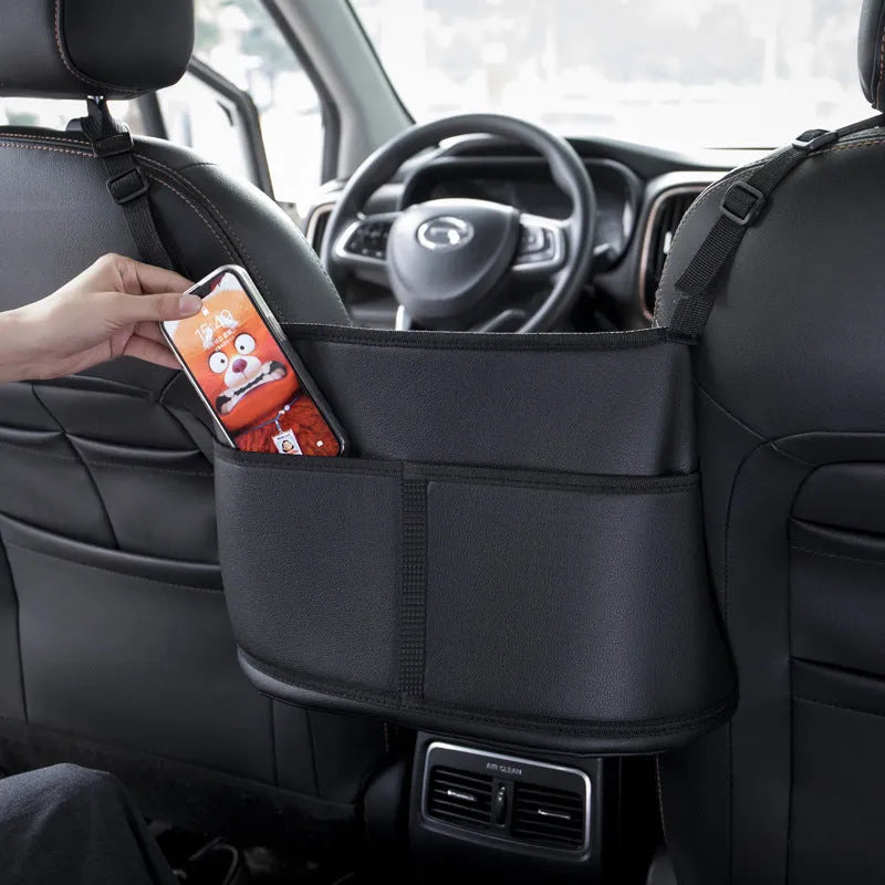 Leather car seat storage bag with carbon fibre pattern black finish showing 38x24x15cm dimensions