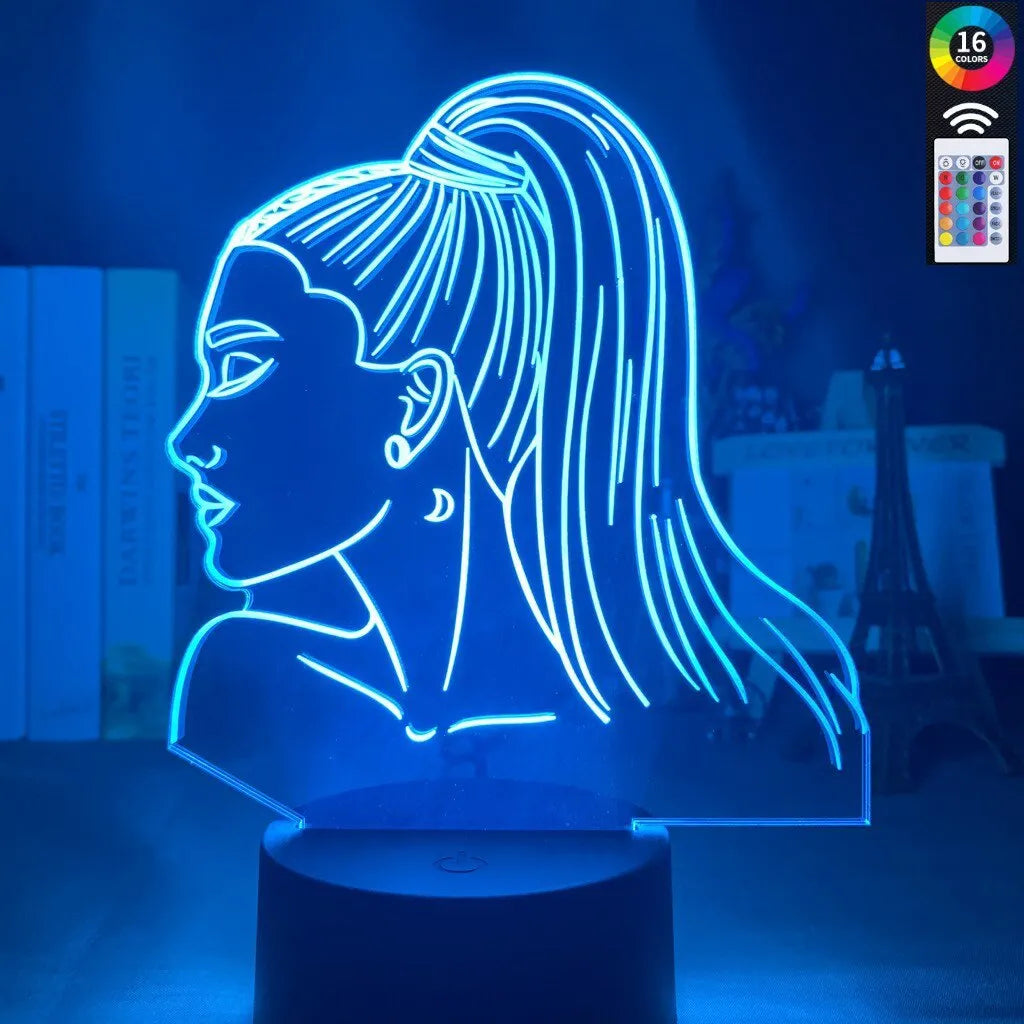 Slim black-based acrylic 3D LED night light showing colour display on wall