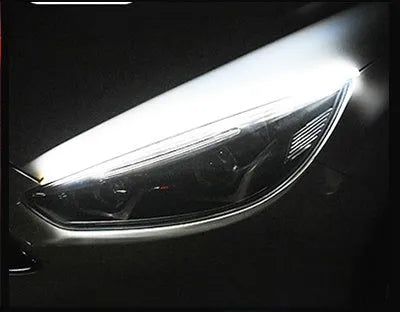 Car LED daytime running light strip in silicone waterproof casing with flowing turn signal effect
