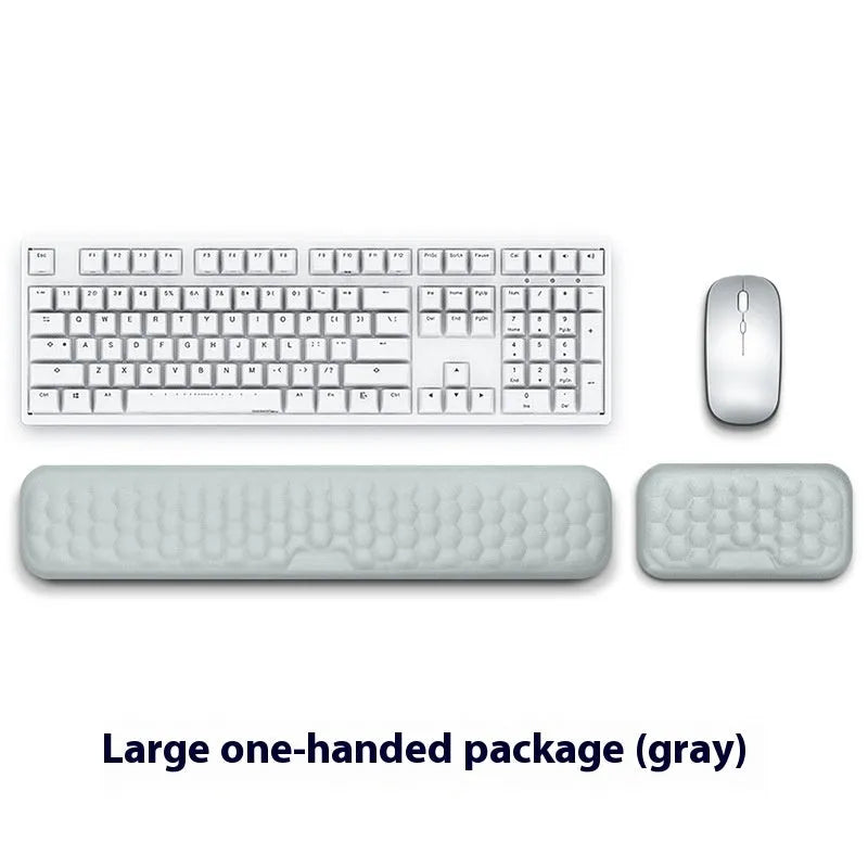 Memory foam mouse wrist rest with silicone base in black cloth and grey leather style options.