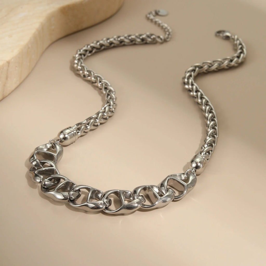 Women's gold-plated stainless steel necklace with geometric pendant design on regular chain