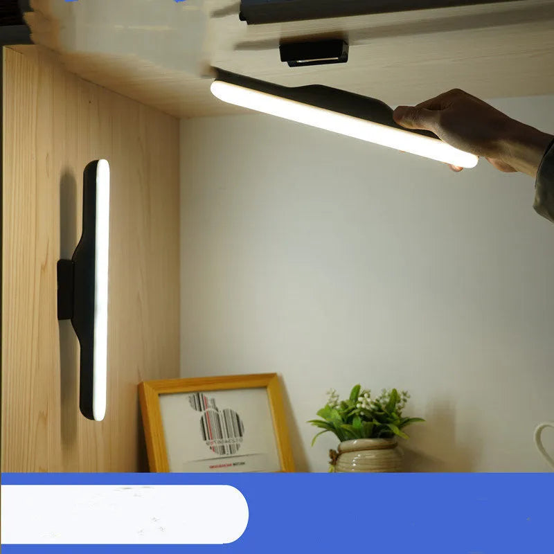 Modern LED desk lamp with touch controls and adjustable brightness settings on wooden desk