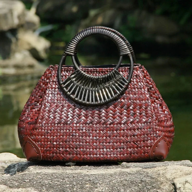 Handwoven rattan straw bag for women with wooden handle, cotton lining, and zipper closure in khaki colour