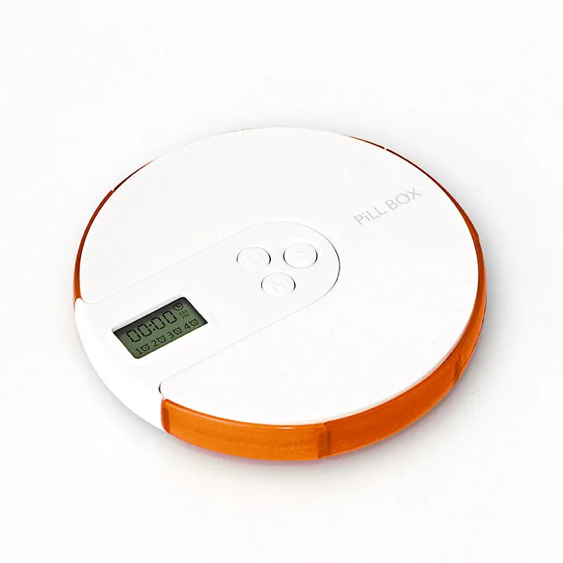Blue seven-compartment alarm clock pill dispenser with digital display, shown next to pills.
