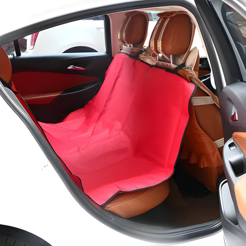 Square red waterproof car pet seat cushion for dogs and cats on a car seat.