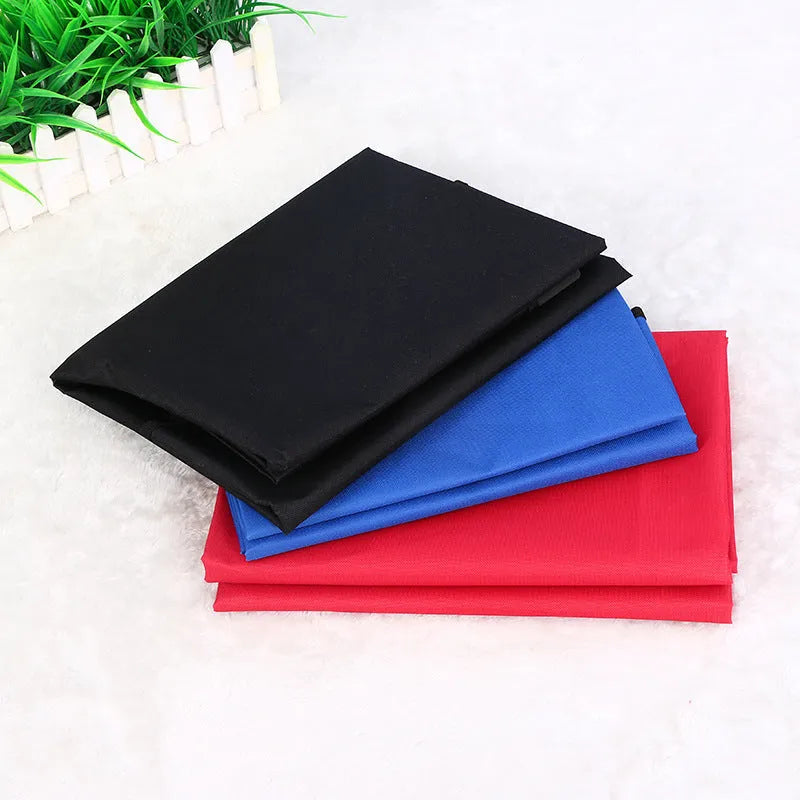 Square red waterproof car pet seat cushion for dogs and cats on a car seat.