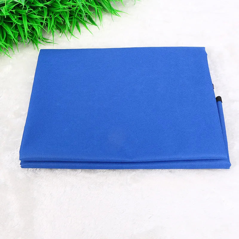 Square red waterproof car pet seat cushion for dogs and cats on a car seat.