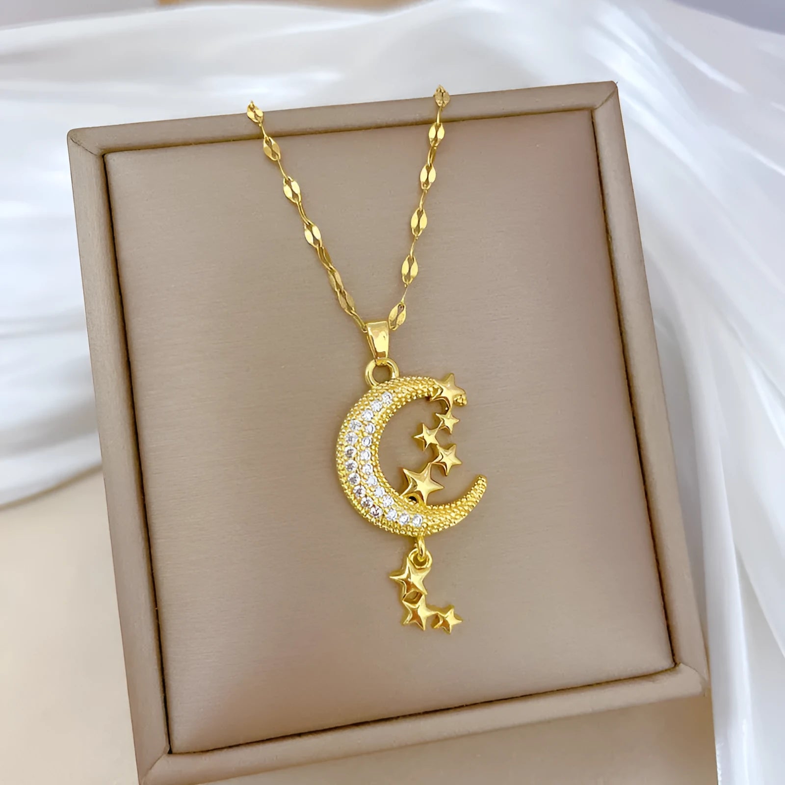 A218 stainless steel necklace with copper geometric moon pendant and diamond detailing