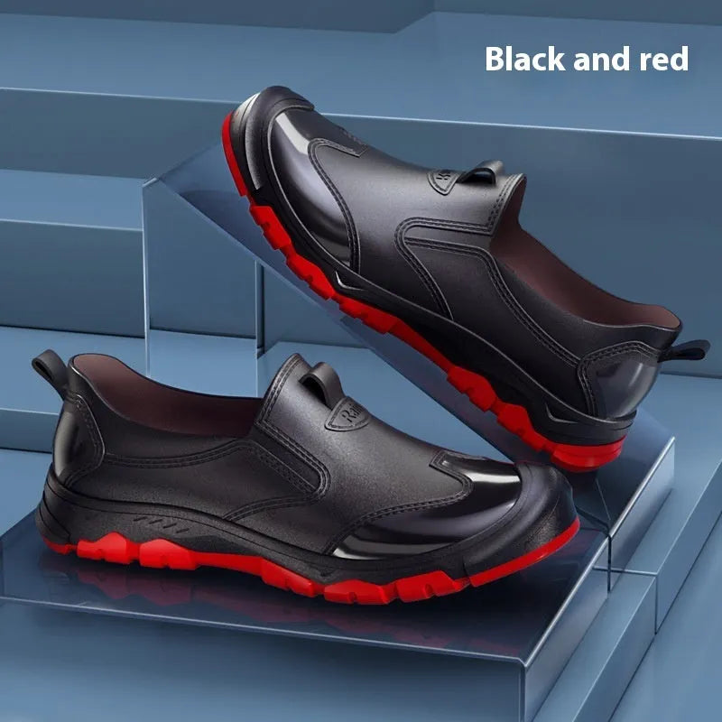 PVC outdoor wading boots in beige and black with red, showing round toe and non-slip plastic sole.