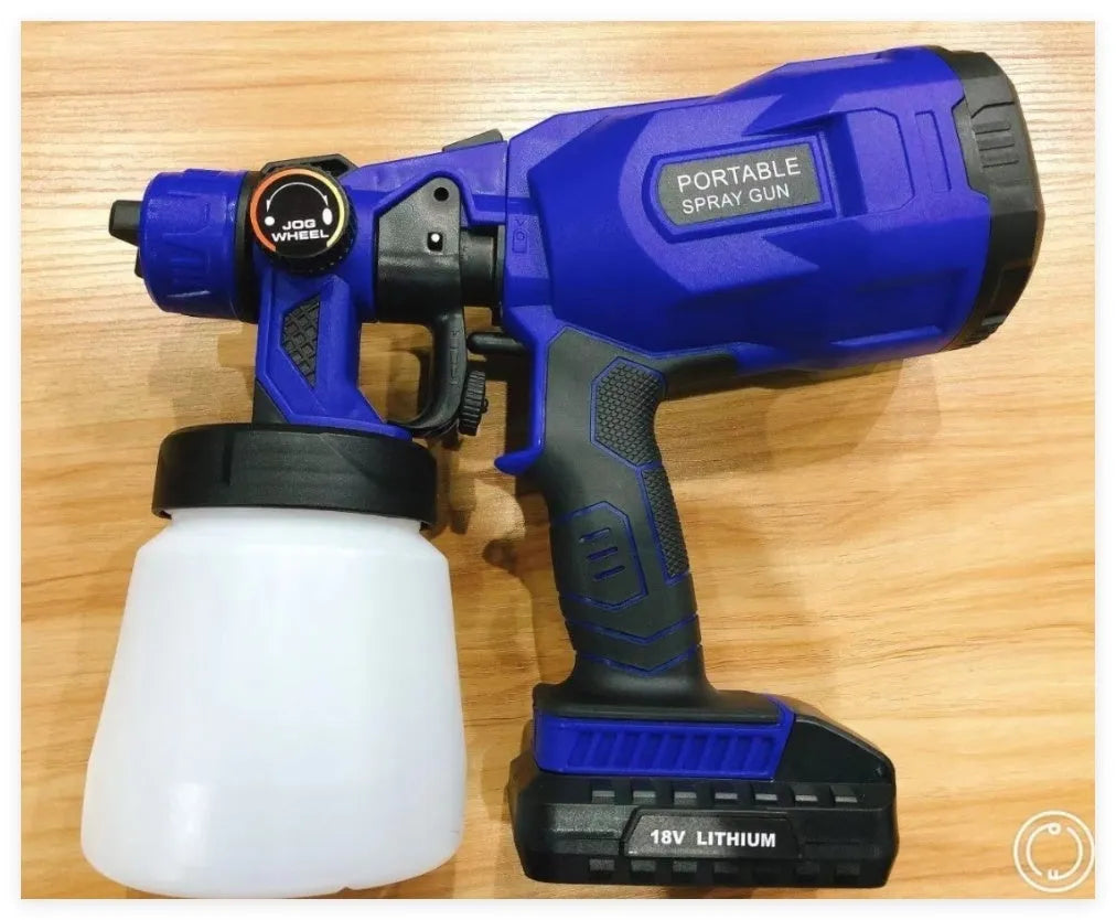 Blue cordless paint spraying machine with a large fluid tank and a detailed nozzle.