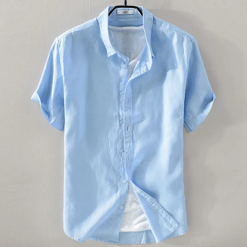 Men's loose fit short sleeve shirt in a cotton linen blend fabric, shown in a solid colour.