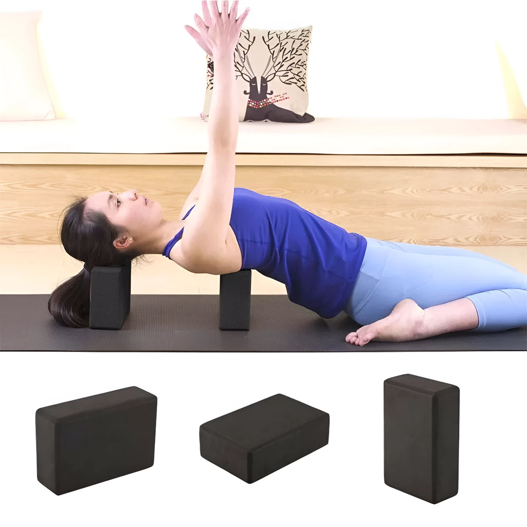 Pure colour EVA yoga brick, thick non-slip mat, and cotton tension band on a floor, in blue, purple, pink, red, black, gray