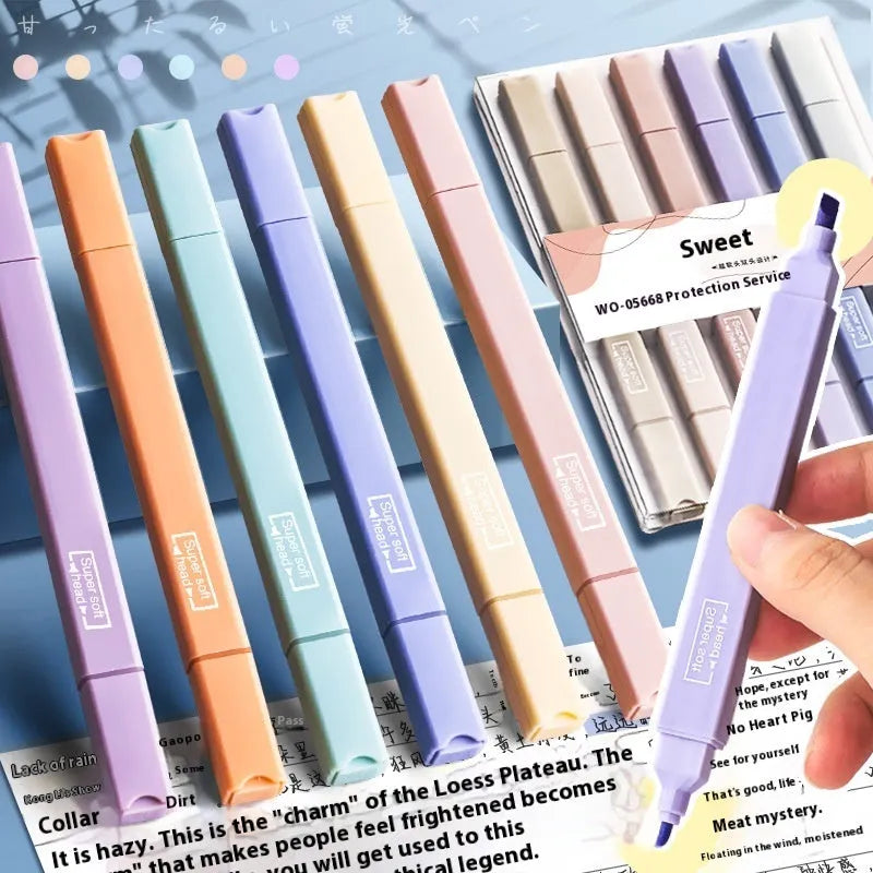 Set of double-ended fluorescent marking pens showing two different coloured nibs on each pen