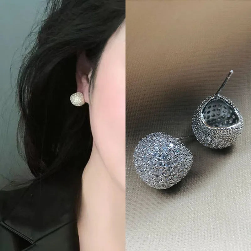 Little Golden Beans geometric drop earrings with full diamond-cut crystal surface and spherical elements