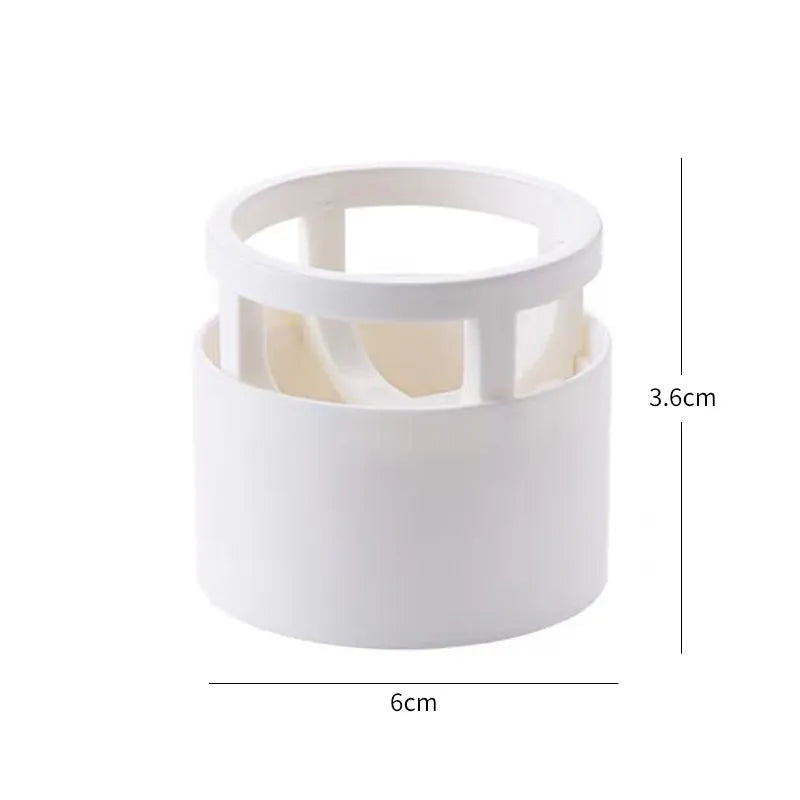 Pink plastic beauty egg stand cosmetics storage rack in girly heart style on a bedroom desktop