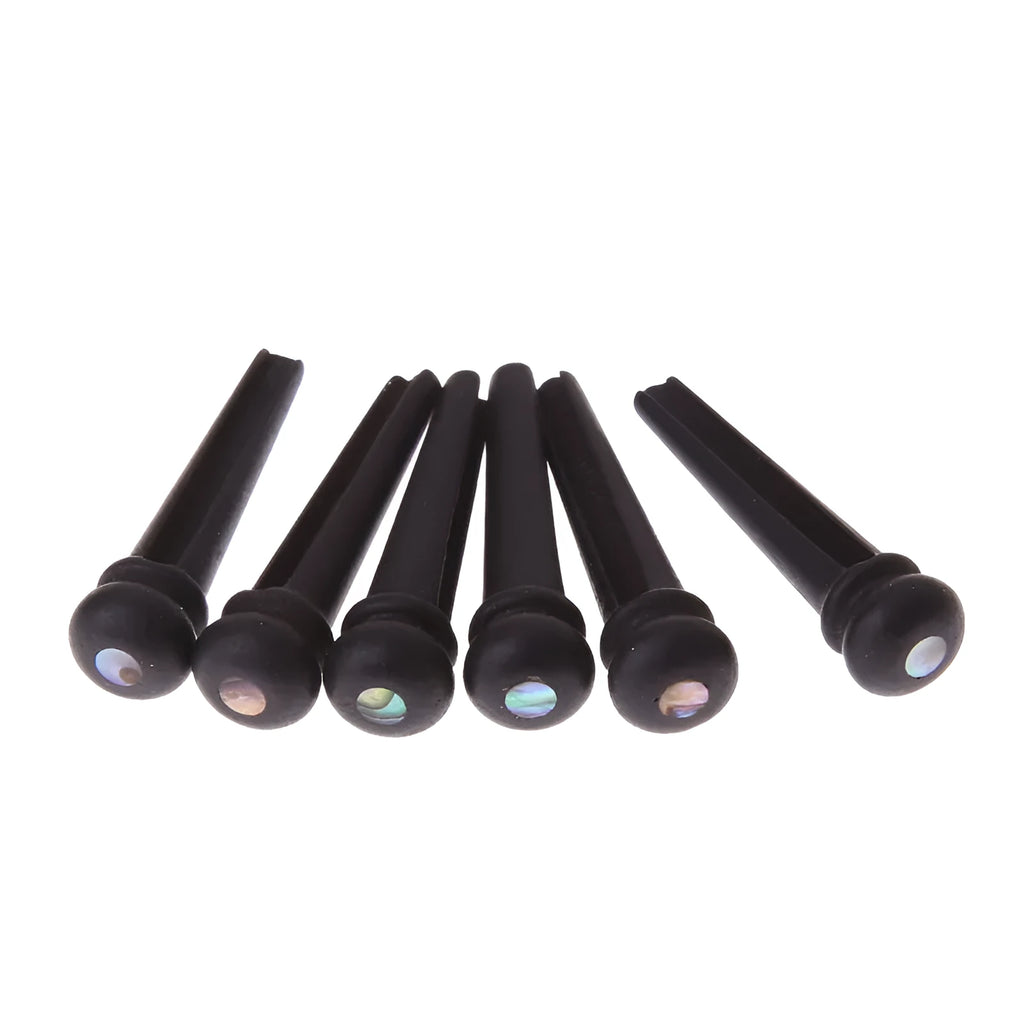 Six matte black ebony guitar bridge pins with a 5.3mm bayonet for folk acoustics.