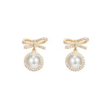 Bow pearl simple micro stud earrings in white with copper electroplated finish and white gold inlaid gemstone