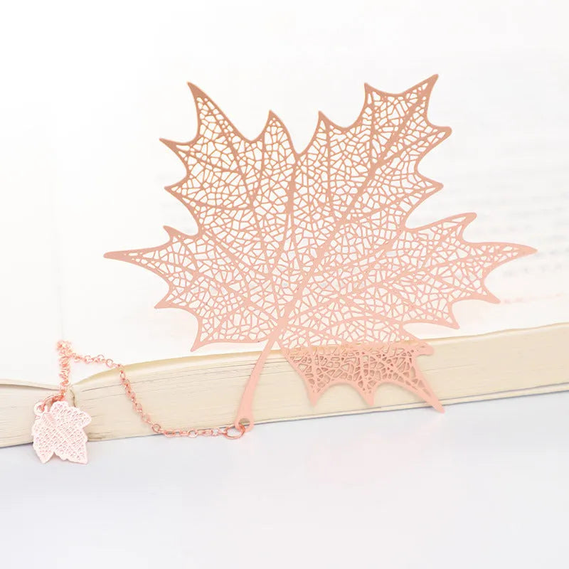 Brass bookmark with hollow-cut leaf design and matching rose gold metal tassel