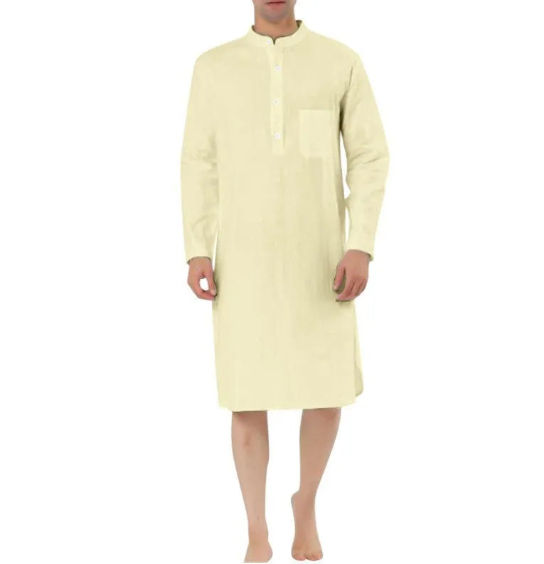 Man wearing a light blue cotton shirt-style robe with front pockets, showcasing casual loungewear.