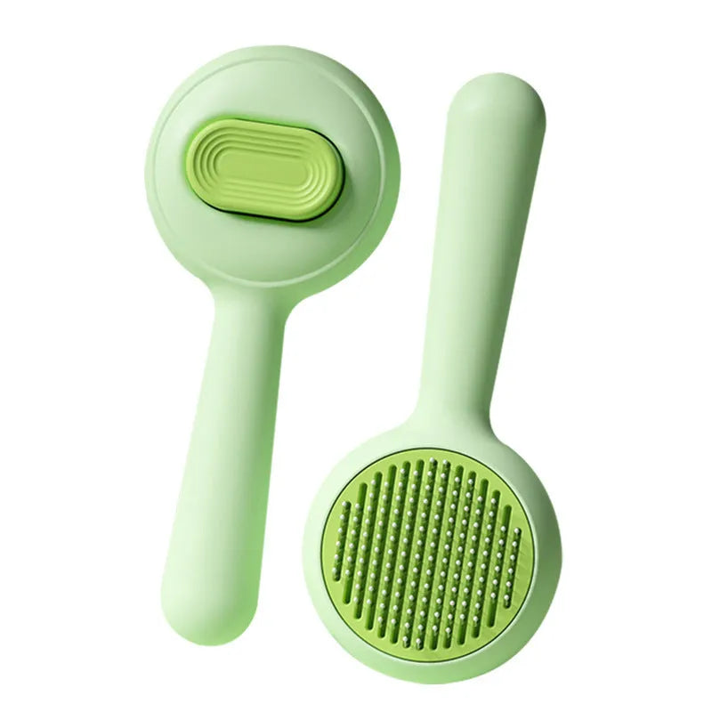 Cat grooming brush with stainless steel comb teeth and non-slip green or yellow handle