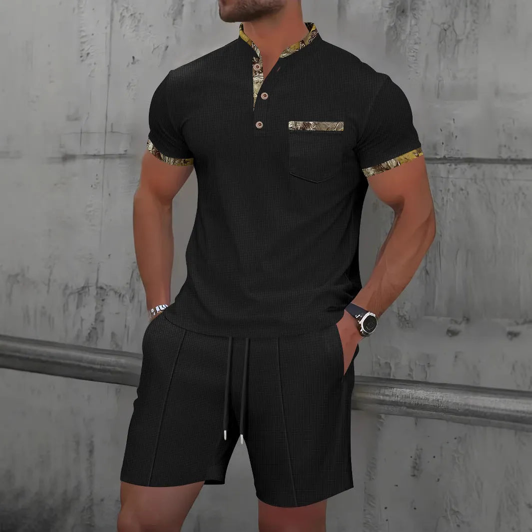 Men's grey waffle zipper polo collar short sleeve top and matching shorts laid flat