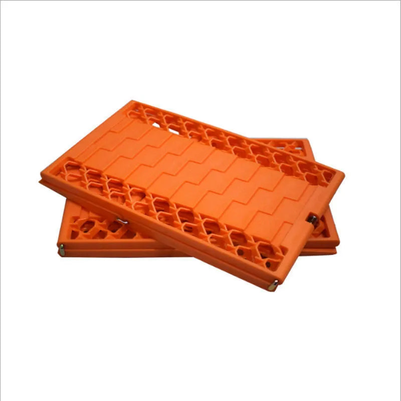 Folding anti slip mud snow rescue boards for automobiles in orange and red colours showing folded and unfolded positions