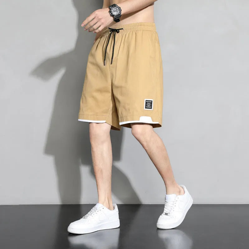 Boys' cotton shorts in black, shown in a casual style for summer home and sports wear.