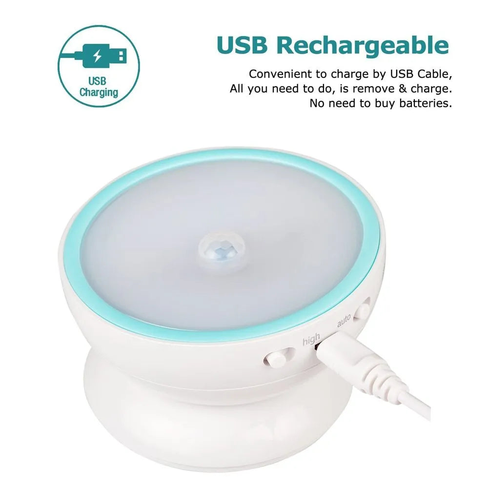 White 360-degree rotating LED human body induction night light with motion sensor, 8.6cm diameter, on a flat surface