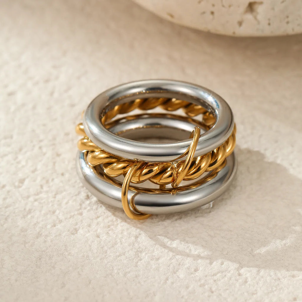 Stacked stainless steel ring with 18K gold plating in three colour variants for women's hand jewellery