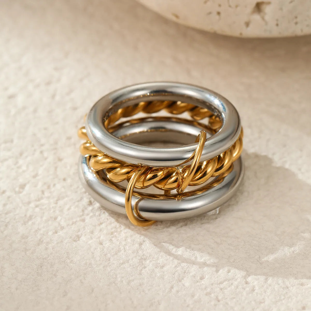 Stacked stainless steel ring with 18K gold plating in three colour variants for women's hand jewellery
