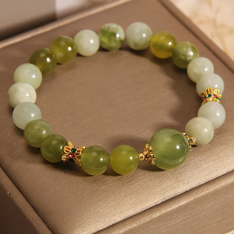Xiuyan jade green women's bracelet in an original light luxury Mori style design.