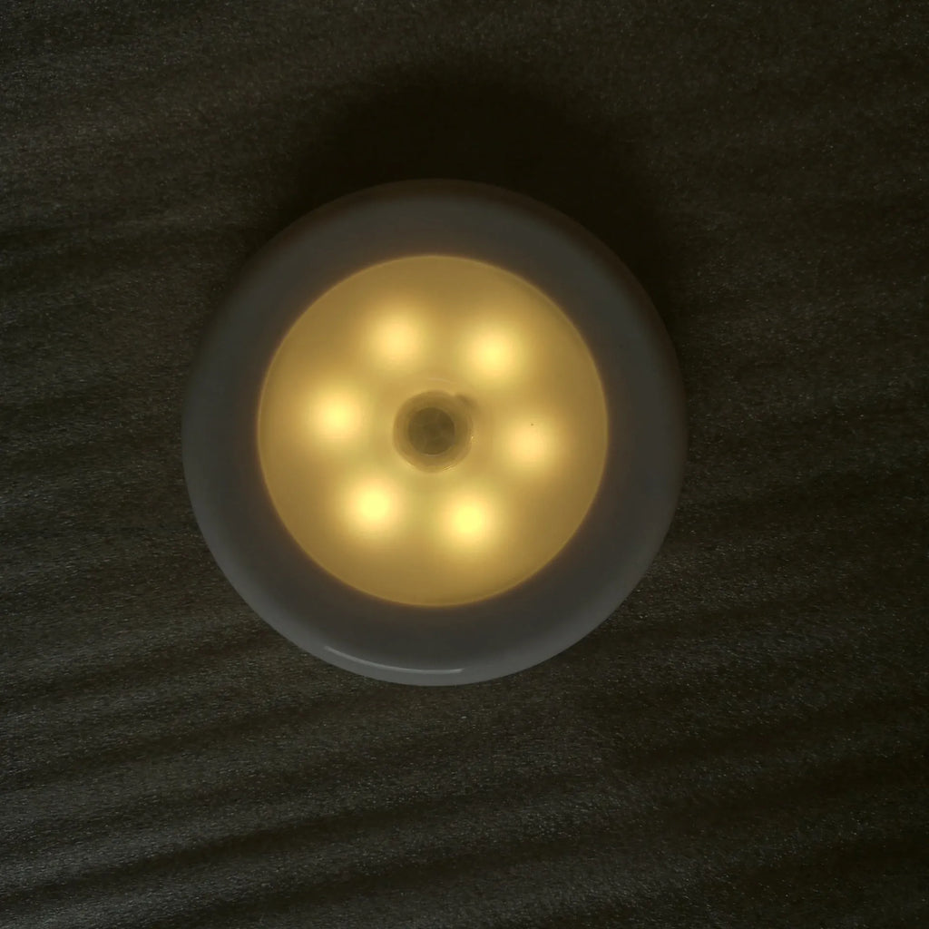 6LED motion sensor night light with strong magnetic base and adhesive pad for cabinet or ceiling mounting
