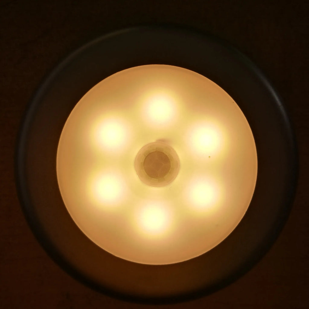 6LED motion sensor night light with strong magnetic base and adhesive pad for cabinet or ceiling mounting