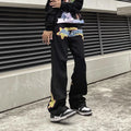 Mens casual print loose jeans in black, showing elasticated waist and relaxed fit