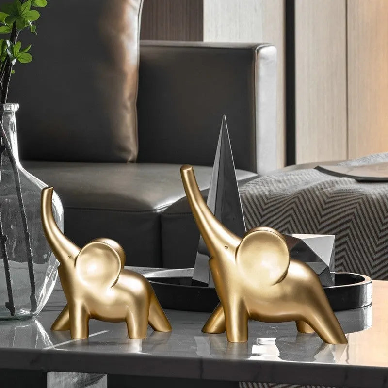 Modern resin elephant ornament in rose gold or white colour, available in large and small sizes.