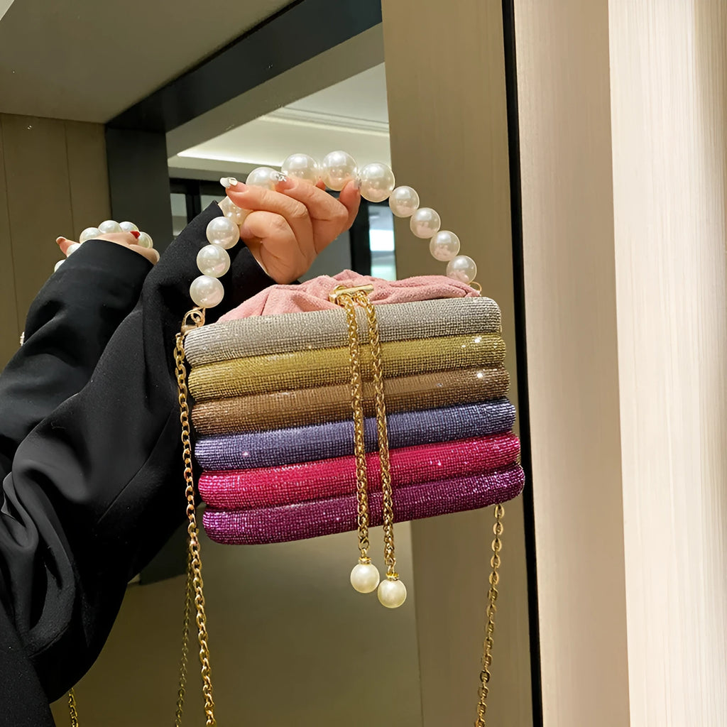 Women's crossbody bag with pearl beaded detailing in soft PU leather showing European retro style and single shoulder strap