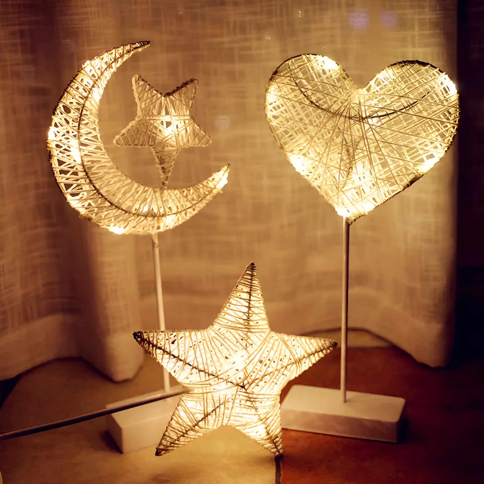 Rattan LED fairy lights with star, heart and moon designs for battery-powered room decoration