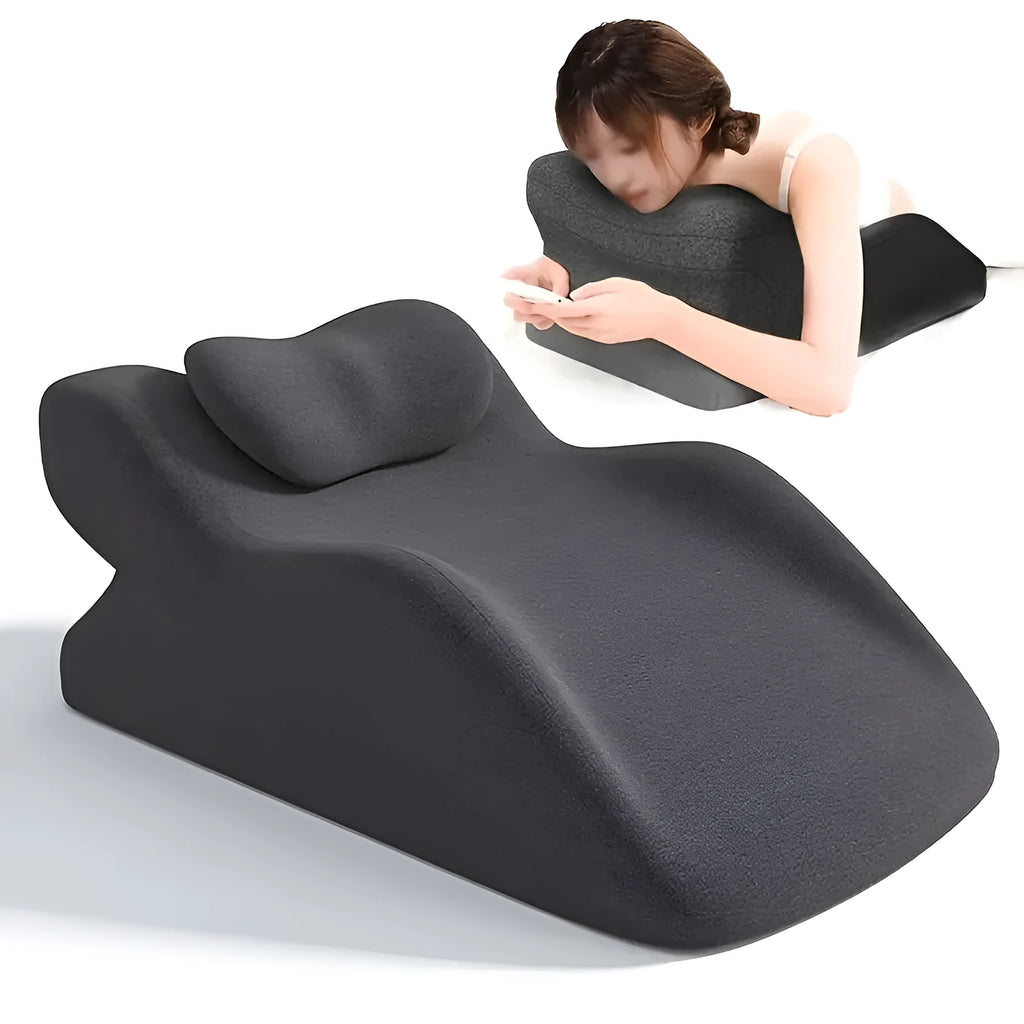 A stomach sleeper pillow designed for lying on your front, shown in blue, dark grey, green, and light grey colour options.