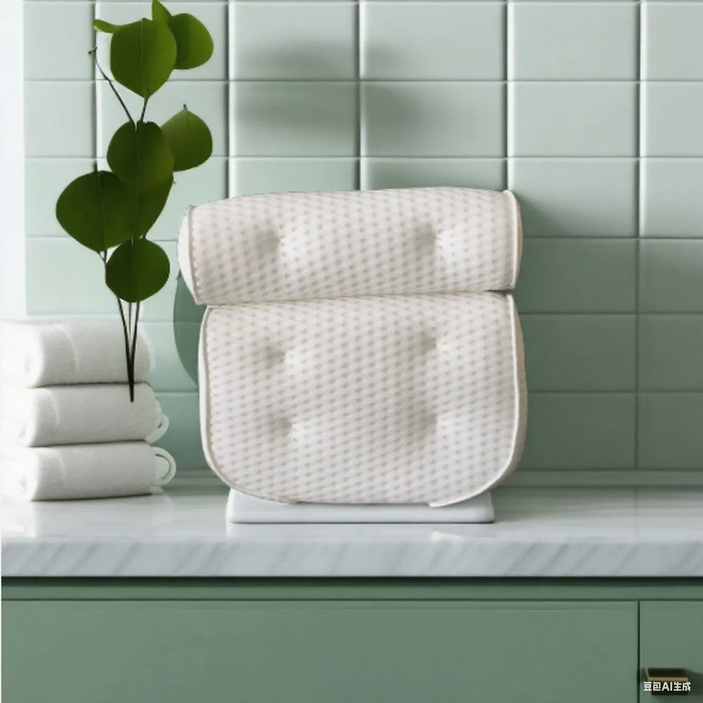 White 3D bathtub pillow with mesh fabric and suction cups on a bathtub edge.