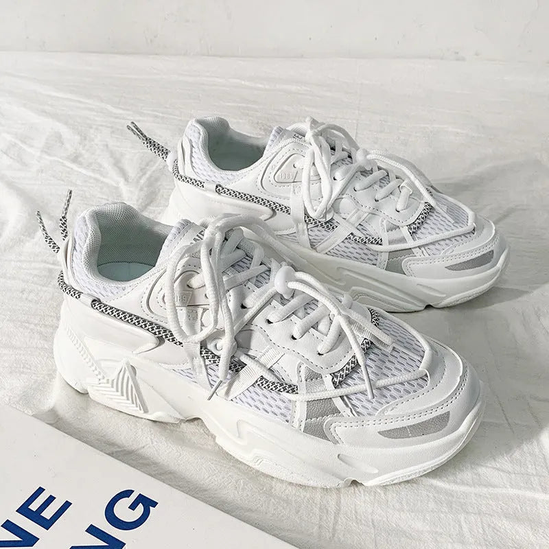 Men's white Korean dad style platform trainers with lace-up front and mesh lining.