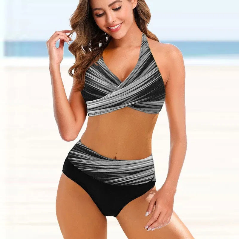 Women's striped tie-dye hollow bikini swimsuit set with high-waist briefs on a model