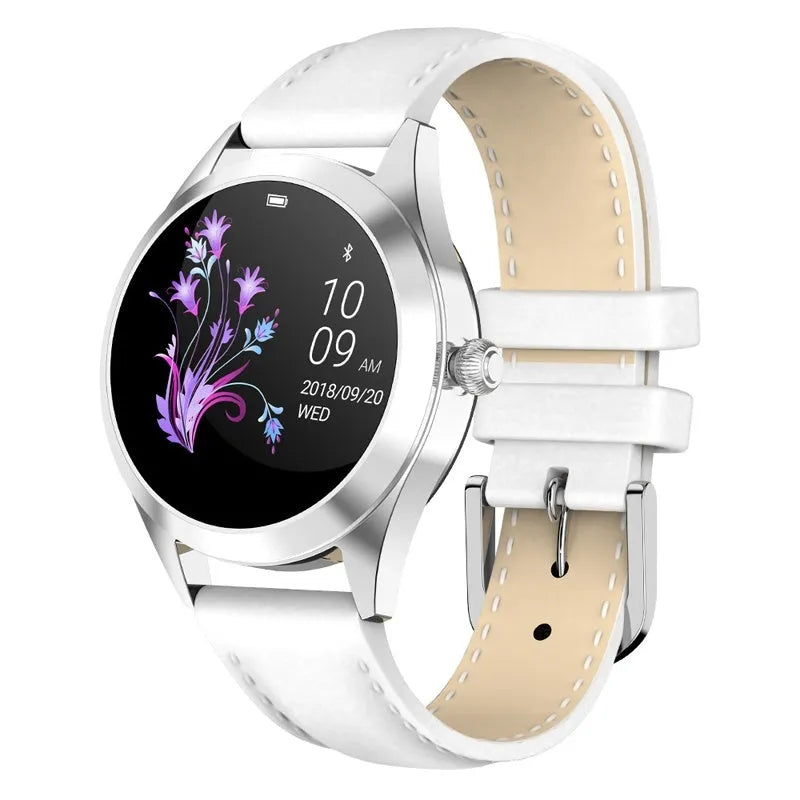 Women's multi-function smartwatch with heart rate monitor on wrist in black, rose gold, silver, or white.