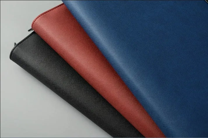 Multifunctional rechargeable A4 PU folder with wireless power charger, 5000mAh battery, and mobile holder – available in black, blue, red.